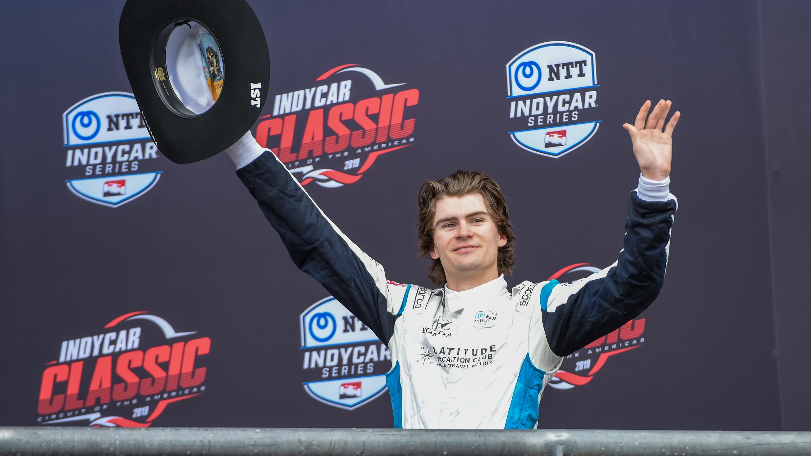 Austin, TX - 24 Mart: Harding Steinbrenner Racing A Honda'yı kutluyor Colton Herta (88)
