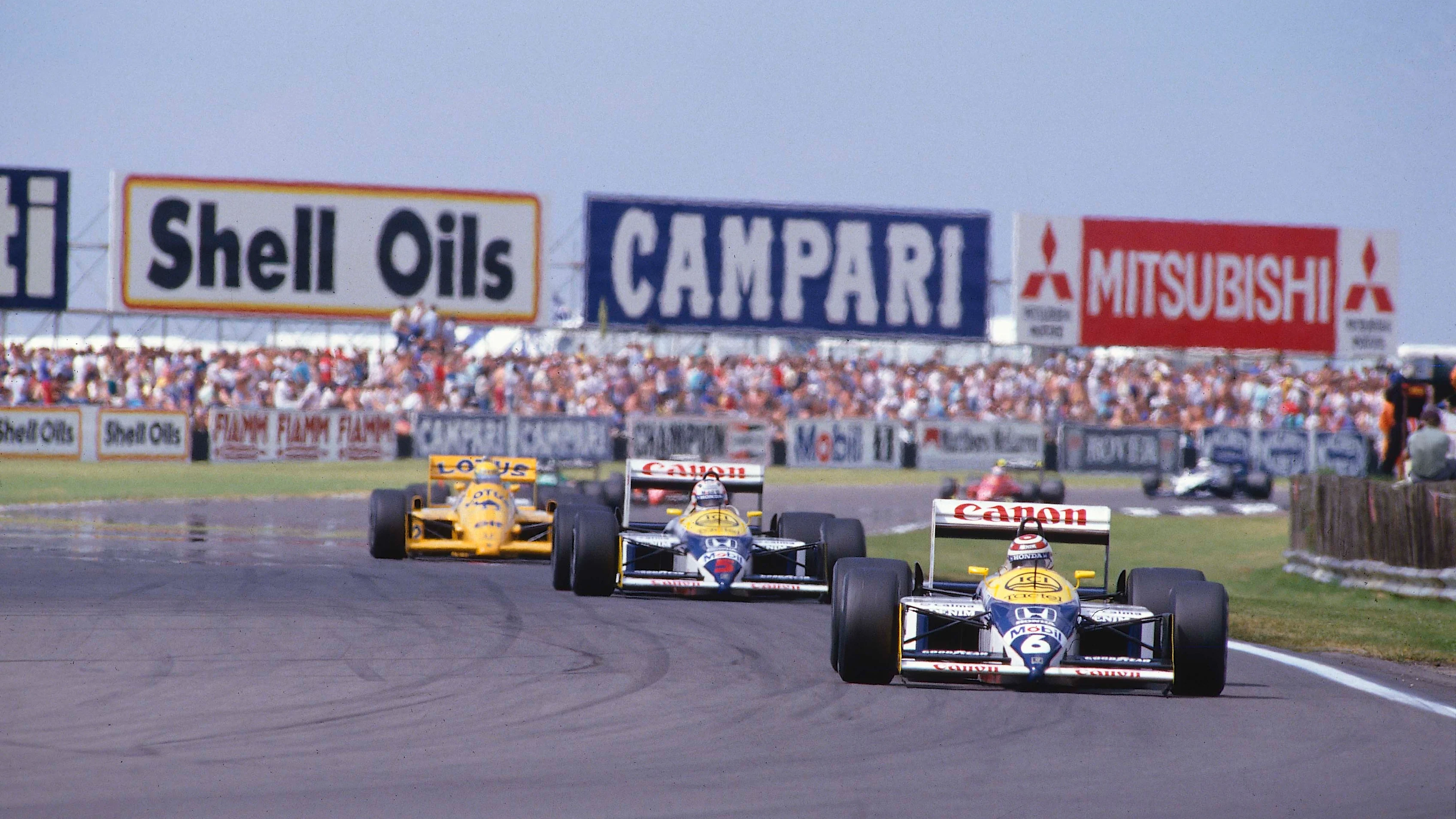 1987 İngiliz Grand Prix. Silverstone, İngiltere. 10-12 Temmuz 1987. Nelson Piquet, Nigel Mansell'e liderlik ediyor